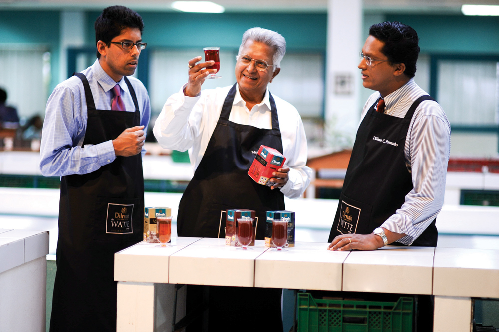 Merrill J Fernando has imparted his knowledge and passion for tea to his sons Malik J Fernando (left) and Dilhan C Fernando