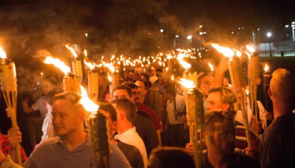 Far-right protestors demonstrate in Charlottesville, Virginia, carrying Tiki torches.