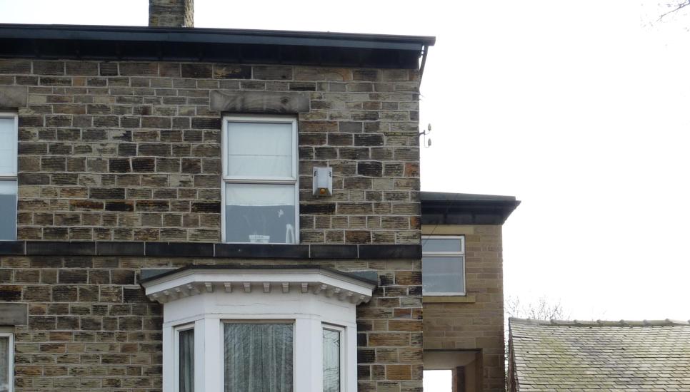 Peter Thornton outside of his ancestral home